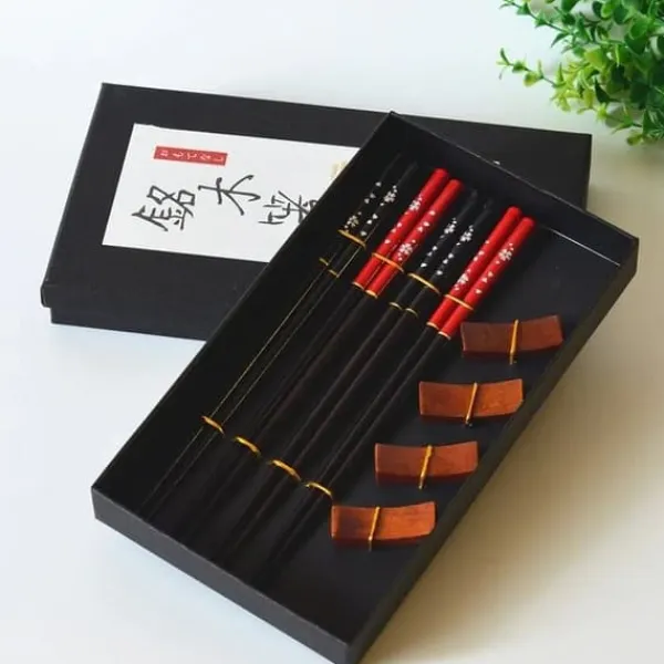 Elegant sæt sushi spisepinde med stativer New