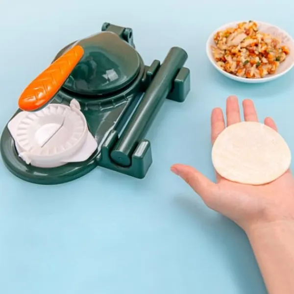 Pressere>Multifunktionell tryckknödelinpackningsmaskin Köksmanuell dumplinginpackningsmaskin