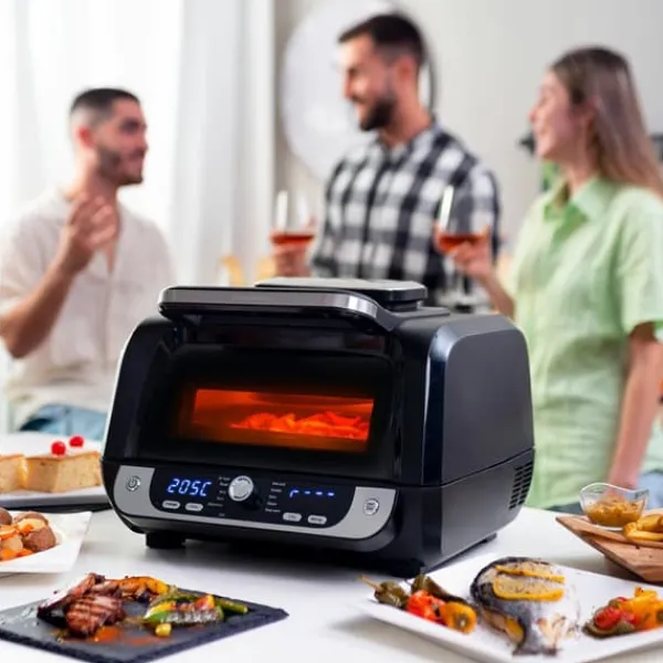 Varmluftsfrituregryde med grill, tilbehør og opskriftsbog InnovaGoods Fryinn 12-in-1 6000 Sort Stål 3400 W 6 L