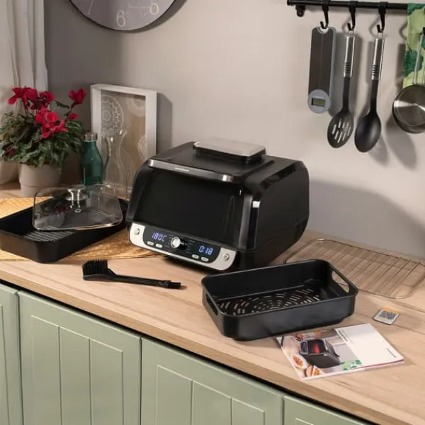 Varmluftsfrituregryde med grill, tilbehør og opskriftsbog InnovaGoods Fryinn 12-in-1 6000 Sort Stål 3400 W 6 L